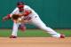 ST. LOUIS, MO - AUGUST 19: Rafael Furcal #15 of the St. Louis Cardinals fields a ground ball against the Pittsburgh Pirates at Busch Stadium on August 19, 2012 in St. Louis, Missouri. The Pirates beat the Cardinals 6-3 in 19 innings. (Photo by Dilip Vis