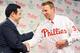 PHILADELPHIA - DECEMBER 16: Pitcher Roy Halladay (R) of the Philadelphia Phillies shakes hands with senior vice president and general manager Ruben Amaro, Jr. after signing with the the team on December 16, 2009 at Citizens Bank Park in Philadelphia, Pen