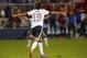 KANSAS CITY, KS - OCTOBER 11: Graham Zusi #19 of the U.S. Men's National Soccer Team celebrates after scoring the first goal of the game against Jamaica midway in the second half at Sporting Park on October 11, 2013 in Kansas City, Kansas. (Photo by Kyl