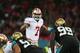 LONDON, ENGLAND - OCTOBER 27: #7 Colin Kaepernick of the San Francisco 49ers gives instructions during the NFL International Series game between San Francisco 49ers and Jacksonville Jaguars at Wembley Stadium on October 27, 2013 in London, England. (Pho