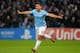 MANCHESTER, ENGLAND - NOVEMBER 05: Sergio Aguero of Manchester City celebrates scoring the second goal during the UEFA Champions League Group D match between Manchester City and CSKA Moscow at the Etihad Stadium on November 5, 2013 in Manchester, Engla