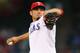 ARLINGTON, TX - SEPTEMBER 26: Matt Garza #22 of the Texas Rangers throws against the Los Angeles Angels in the first inning at Rangers Ballpark in Arlington on September 26, 2013 in Arlington, Texas. (Photo by Ronald Martinez/Getty Images)