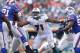 MIAMI GARDENS, FL - DECEMBER 23: Jonathan Martin #71 of the Miami Dolphins defends along the line against the Buffalo Bills on December 23, 2012 at Sun Life Stadium in Miami Gardens, Florida. The Dolphins defeated the Bills 24-10. (Photo by Joel Auerbach/