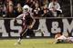 COLLEGE STATION, TX - NOVEMBER 02: Johnny Manziel #2 of the Texas A&M Aggies scrambles out of the pocket against the UTEP Miners at Kyle Field on November 2, 2013 in College Station, Texas. (Photo by Bob Levey/Getty Images)