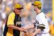 PITTSBURGH, PA - SEPTEMBER 15: Manager Clint Hurdle celebrates with Justin Morneau #66 of the Pittsburgh Pirates after a 3-2 win over the Chicago Cubs on September 15, 2013 at PNC Park in Pittsburgh, Pennsylvania. (Photo by Joe Sargent/Getty Images)