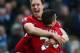 MANCHESTER, ENGLAND - DECEMBER 09: Phil Jones of Manchester United celebrates with Robin van Persie at the end of the Barclays Premier League match between Manchester City and Manchester United at the Etihad Stadium on December 9, 2012 in Manchester, Eng