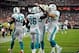 Aug 17, 2013; Houston, TX, USA; Miami Dolphins running back Lamar Miller (26) and fullback Charles Clay (42) and guard Richie Incognito (68) celebrate Miller's touchdown against the Houston Texans during the first half at Reliant Stadium. Mandatory Credit