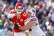 Nov 3, 2013; Orchard Park, NY, USA; Buffalo Bills defensive tackle Kyle Williams (95) hits Kansas City Chiefs quarterback Alex Smith (11) after a pass during the first half at Ralph Wilson Stadium. Mandatory Credit: Kevin Hoffman-USA TODAY Sports