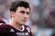 COLLEGE STATION, TX - SEPTEMBER 14: Johnny Manziel #2 of Texas A&M Aggies waits near the bench in the fourth quarter during the game against the Alabama Crimson Tide at Kyle Field on September 14, 2013 in College Station, Texas. (Photo by Scott Halleran