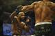 Nov 6, 2013; Fort Campbell, KY, USA; Rony Markes (red gloves) fights Yoel Romero (blue gloves) in the middleweight bout during UFC Fight for the Troops at Fort Campbell. Mandatory Credit: Joshua Lindsey-USA TODAY Sports