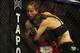 Nov 6, 2013; Fort Campbell, KY, USA; Liz Carmouche (red gloves) fights Alexis Davis (blue gloves) in the women's bantamweight bout during UFC Fight for the Troops at Fort Campbell. Mandatory Credit: Joshua Lindsey-USA TODAY Sports