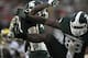 Nov 2, 2013; East Lansing, MI, USA; Michigan State Spartans defensive end Shilique Calhoun (89) and wide receiver Bennie Fowler (13) celebrate during the third quarter against the Michigan Wolverines at Spartan Stadium. Spartans beat the Wolverines 29-6.