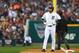 DETROIT, MI - OCTOBER 15: Jhonny Peralta #27 of the Detroit Tigers stands on third base in the fifth inning against the Boston Red Sox during Game Three of the American League Championship Series at Comerica Park on October 15, 2013 in Detroit, Michigan.