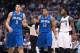 Oct 14, 2013; Dallas, TX, USA; Orlando Magic center Nikola Vucevic (9) and small forward Tobias Harris (12) and Dallas Mavericks small forward Jae Crowder (9) wait for play to resume during the game at the American Airlines Center. The Magic defeated the