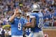DETROIT, MI - OCTOBER 27: Matthew Stafford #9 of the Detroit Lions celebrates with teammate Calvin Johnson #81 after a first quarter touchdown the game against the Dallas Cowboys at Ford Field on October 27, 2013 in Detroit, Michigan. (Photo by Leon Hali