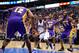 Nov 24, 2012; Dallas, TX, USA; Dallas Mavericks point guard Rodrigue Beaubois (3) drives to the basket past Los Angeles Lakers center Dwight Howard (12) and small forward Metta World Peace (15) and shooting guard Jodie Meeks (20) and shooting guard Kobe B