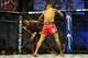 Nov 6, 2013; Fort Campbell, KY, USA; Yves Edwards (red gloves) fights Yancy Medeiros (blue gloves) in the lightweight bout during UFC Fight for the Troops at Fort Campbell. Mandatory Credit: Joshua Lindsey-USA TODAY Sports