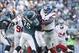 Oct 27, 2013; Philadelphia, PA, USA; New York Giants defensive end Jason Pierre-Paul (90) tries to get past Philadelphia Eagles offensive tackle Lane Johnson (65) during the game at Lincoln Financial Field. Mandatory Credit: Chris Faytok/The Star-Ledger v
