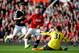 MANCHESTER, ENGLAND - OCTOBER 19: Wayne Rooney of Manchester United has his attempt on goal saved by goalkeeper Artur Boruc of Southampton during the Barclays Premier League match between Manchester United and Southampton at Old Trafford on October 19, 2