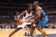 20 Nov 2001 Kwame Brown #5 of the Washington Wizards attempts to work the ball in the post against Elden Campbell #5 of the Charlotte Hornets at the MCI Center in Washington, D.C. DIGITAL IMAGE NOTE TO USER: User expressly acknowledges and agrees that,