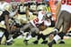 TAMPA, FL - SEPTEMBER 15: Running back Doug Martin #22 of the Tampa Bay Buccaneers runs for a gain against the New Orleans Saints September 15, 2013 at Raymond James Stadium in Tampa, Florida. The Saints won 16 - 14. (Photo by Al Messerschmidt/Getty Image