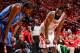 HOUSTON, TX - MAY 3: Kevin Durant #35 of the Oklahoma City Thunder and James Harden #13 of the Houston Rockets wait to resume play in Game Six of the Western Conference Quarterfinals during the 2013 NBA Playoffs on May 3, 2013 at the Toyota Center in Hous