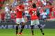 LONDON, ENGLAND - AUGUST 11: Robin van Persie of Manchester United shakes hands with Shinji Kagawa as he is substituted during the FA Community Shield match between Manchester United and Wigan Athletic at Wembley Stadium on August 11, 2013 in London, Eng