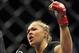 August 18, 2012; San Diego, CA, USA; Ronda Rousey (black shirt) celebrates after she defeated Sarah Kaufman (not pitcured) during their Strikeforce MMA women's bantamweight title bout at the Valley View Casino Center. Rousey won in 54 seconds of the fir
