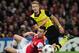 LONDON, ENGLAND - OCTOBER 22: Marco Reus of Borussia Dortmund and Laurent Koscielny of Arsenal in action during the UEFA Champions League Group F match between Arsenal and Borussia Dortmund at Emirates Stadium on October 22, 2013 in London, England. (Ph