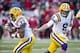Nov 23, 2012; Fayetteville, AR, USA; Louisiana State Tigers quarterback Zach Mettenberger (8) hands the ball off to running back Jeremy Hill (33) during the second half of a game against the Arkansas Razorbacks at Donald W. Reynolds Stadium. LSU defeated