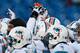 FOXBORO, MA - DECEMBER 30: Members of the Miami Dolphins huddles before a game with the New England Patriots at Gillette Stadium on December 30, 2012 in Foxboro, Massachusetts. (Photo by Jim Rogash/Getty Images)