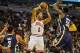 Oct 18, 2013; Chicago, IL, USA; Chicago Bulls guard Derrick Rose passes against the Indian Pacers George Hill and Roy Hibbert at the United Center. Mandatory Credit: Matt Marton-USA TODAY Sports