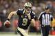 NEW ORLEANS, LA - OCTOBER 27: Drew Brees #9 of the New Orleans Saints runs the ball against the Buffalo Bills at Mercedes-Benz Superdome on October 27, 2013 in New Orleans, Louisiana. The Saints defeated the Bills 35-14. (Photo by Wesley Hitt/Getty Images