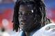 MIAMI - OCTOBER.6: Running back Ricky Williams #34 of the Miami Dolphins looks on from the sidelines during the game against the New England Patriots on October 6, 2002 at Pro Player Stadium in Miami, Florida. Dolphins won 26-13. (Photo By Eliot J. Schec