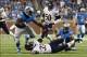 Sep 29, 2013; Detroit, MI, USA; Detroit Lions running back Joique Bell (35) runs over Chicago Bears cornerback Charles Tillman (33) in the first quarter at Ford Field. Mandatory Credit: Rick Osentoski-USA TODAY Sports
