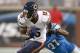 DETROIT, MI - SEPTEMBER 29: Brandon Marshall #15 of the Chicago Bears tries to break away from Rashean Mathis #31 of the Detroit Lions in the first quarter at Ford Field on September 29, 2013 in Detroit, Michigan. (Photo by Gregory Shamus/Getty Images)