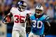 CHARLOTTE, NC - SEPTEMBER 20: Andre Brown #35 of the New York Giants breaks away from Charles Godfrey #30 of the Carolina Panthers for a long gain during play at Bank of America Stadium on September 20, 2012 in Charlotte, North Carolina. (Photo by Grant