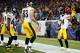 FOXBORO, MA - NOVEMBER 03: Antonio Brown #84 of the Pittsburgh Steelers celebrates his touchdown catch in the second quarter in front of teammates against the New England Patriots at Gillette Stadium on November 3, 2013 in Foxboro, Massachusetts. (Photo