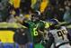 EUGENE, OR. - SEPTEMBER 28: Quarterback Marcus Mariota #8 of the Oregon Ducks passes the ball during the second quarter of the game against the California Golden Bears at Autzen Stadium on September 28, 2013 in Eugene, Oregon. (Photo by Steve Dykes/Getty