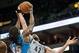Nov 21, 2012; Minneapolis, MN, USA; Minnesota Timberwolves power forward Kevin Love (42) rebounds against Denver Nuggets small forward Kenneth Faried (35) during the third quarter at Target Center. Nuggets won 101-94. Mandatory Credit: Greg Smith-USA TOD