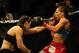 Nov 6, 2013; Fort Campbell, KY, USA; Liz Carmouche (red gloves) fights Alexis Davis (blue gloves) in the women's bantamweight bout during UFC Fight for the Troops at Fort Campbell. Mandatory Credit: Joshua Lindsey-USA TODAY Sports