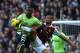 LONDON, ENGLAND - NOVEMBER 02: Christian Benteke of Villa is beaten to the ball by Winston Reid of West Ham during the Barclays Premier League match between West Ham United and Aston Villa at Upton Park on November 02, 2013 in London, England. (Photo by C
