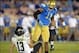 Nov 2, 2013; Pasadena, CA, USA; UCLA Bruins linebacker Anthony Barr (11) is called for a roughing the passer penalty after a hit on Colorado Buffaloes quarterback Sefo Liufau (13) at Rose Bowl. UCLA defeated Colorado 45-23. Mandatory Credit: Kirby Lee-USA