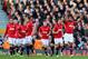 LONDON, ENGLAND - NOVEMBER 02: Luis Antonio Valencia of Manchester United (R) celebrates scoring the first goal during the Barclays Premier League match between Fulham and Manchester United at Craven Cottage on November 2, 2013 in London, England. (Photo