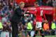 MANCHESTER, ENGLAND - OCTOBER 26: David Moyes the manager of Manchester United talks with Wayne Rooney during the Barclays Premier League match between Manchester United and Stoke City at Old Trafford on October 26, 2013 in Manchester, England. (Photo b