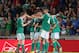 BELFAST, NORTHERN IRELAND - AUGUST 14: The players of Northern Ireland celebrate after victory over Russia in the FIFA 2014 World Cup Group F Qualifier match between Northern Ireland and Russia at Windsor Park on August 14, 2013 in Belfast, Northern Irel
