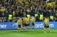 LONDON, ENGLAND - MAY 25: Ilkay Gundogan of Borussia Dortmund (2L) celebrates with team mates after scoring their first goal from the penalty spot during the UEFA Champions League final match between Borussia Dortmund and FC Bayern Muenchen at Wembley St