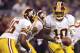 MINNEAPOLIS, MN - NOVEMBER 7: Robert Griffin III #10 of the Washington Redskins hands the ball to teammate Alfred Morris #46 during the first quarter of the game against the Minnesota Vikings on November 7, 2013 at Mall of America Field at the Hubert H. H