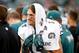 Nov 3, 2013; Oakland, CA, USA; Philadelphia Eagles wide receiver Riley Cooper (14) talks with teammates during the fourth quarter on the sidelines during a game against the Oakland Raiders at O.co Coliseum. The Eagles won 49-20. Mandatory Credit: Bob Sta