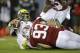PALO ALTO, CA - NOVEMBER 07: Quarterback Marcus Mariota #8 of the Oregon Ducks is sacked by linebacker Trent Murphy #93 of the Stanford Cardinal in the first quarter at Stanford Stadium on November 7, 2013 in Palo Alto, California. (Photo by Ezra Shaw/G